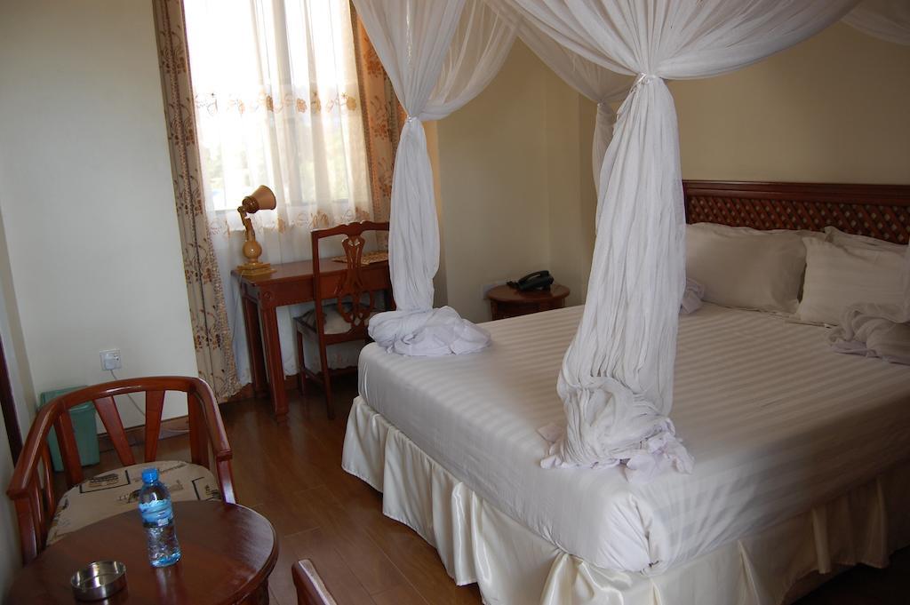 Arusha Tourist Inn Hotel Номер фото
